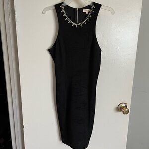 Audrey Hepburn inspired Elegant Black Sleeveless Dress with Embellished Neckline